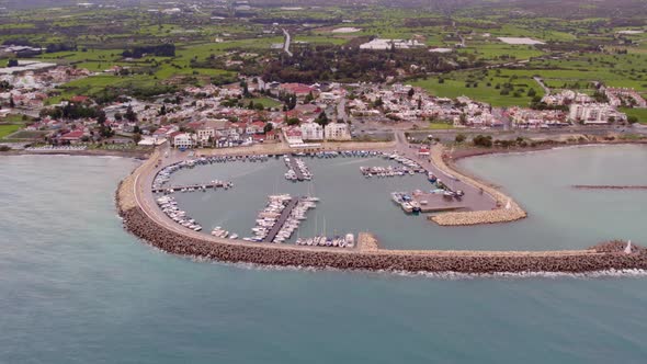 Aerial Drone Video of Zygi Marina Harbour in Cyprus Blue Mediterranean Sea Yachts Boats Greece Ocean