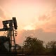 old pumpjack pumping crude oil from oil well, timelapse - VideoHive Item for Sale