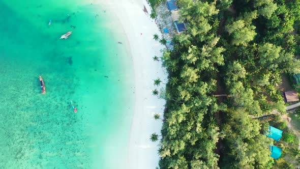 Aerial seascape of tropical seashore beach holiday by clear sea and white sandy background of a dayo