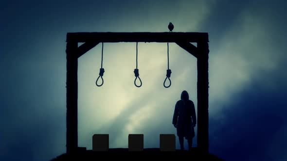 Executioner Standing In A Gallows In A Dark Cloudy Day