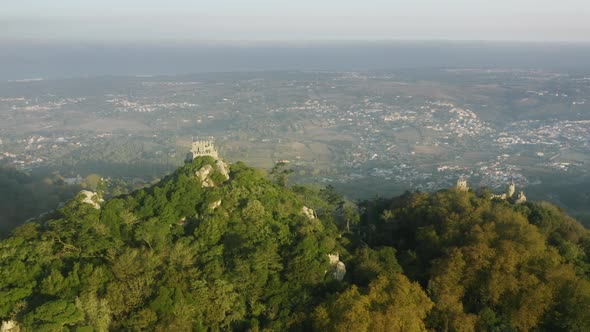 Aerial Footage of Cinematic Landscape with Historic Architecture Within Greenery