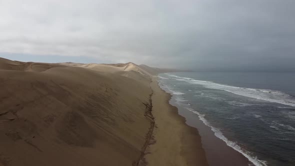 High angle view on the Sandwich Harbour with amazing dunes and Atlantic ocean