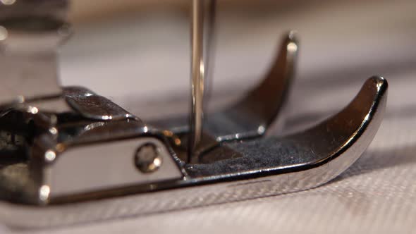 Needle in the Sewing Machine. Close Up