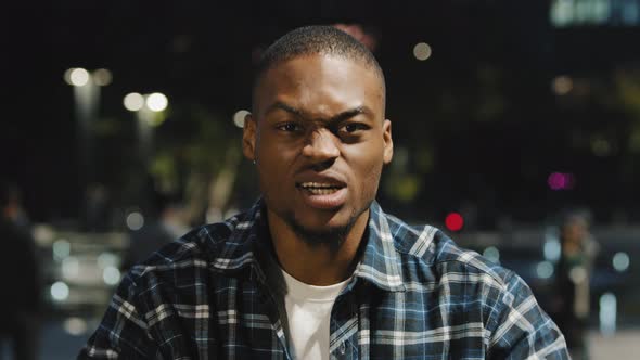 Closeup Male Agressive Face African American Guy Man Shouts Cheering for Team Upset Frustrated