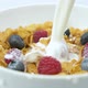 Pouring Milk On Corn Flakes With Raspberries And Blueberries - VideoHive Item for Sale
