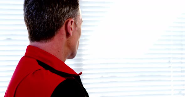 Portrait of male doctor standing