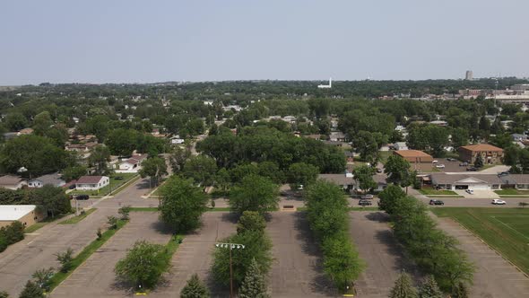 Mixed residential and business neighborhood in Bismarck, North Dakota. Tree lined streets. alt