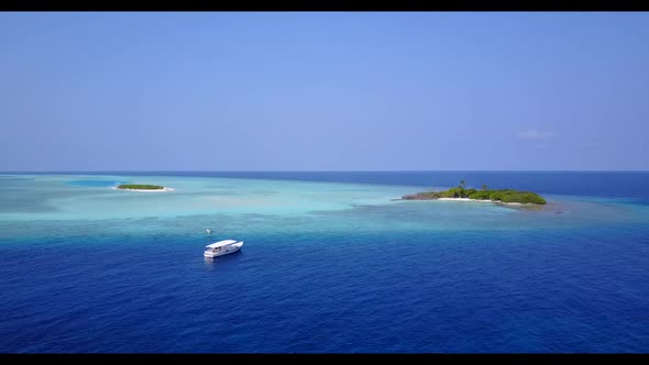 Aerial drone sky of tranquil bay beach lifestyle by transparent sea with white sand background of jo