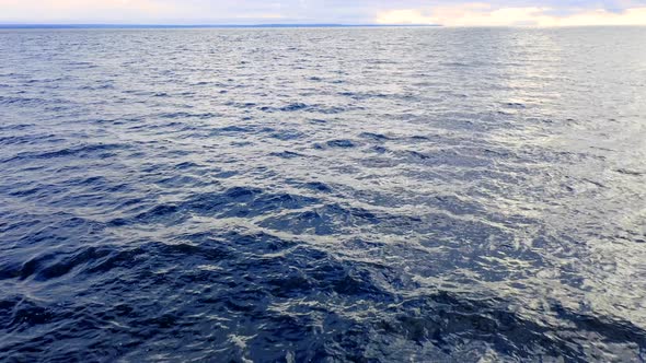  Flight over the ocean. Aerial ocean view. Top fly over the sea.