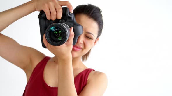 Photographer taking photo with professional digital camera