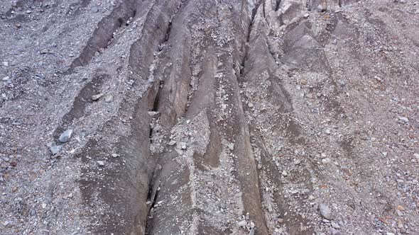 Aerial View of Belvedere Glacier Deep and Old Crevasses Ice in Belvedere Valley Around Mountains