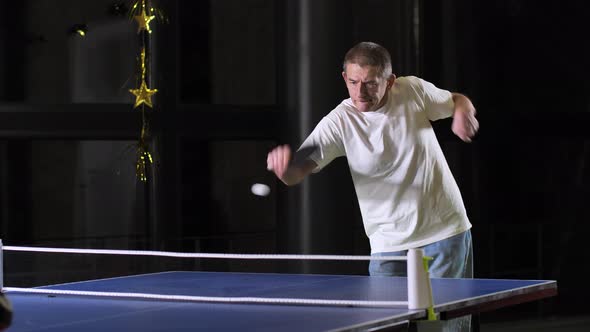 Adult Man with Cerebral Palsy Playing Table Tennis