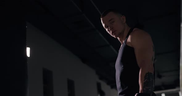 Portrait of Confident Boxer Ready To Fighting with Punching Bag