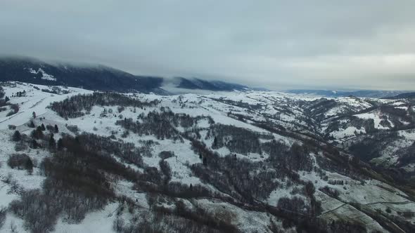 Aerial Drone View Flight Over Winter Mountain Forest