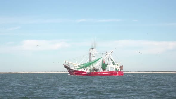 a shrimp boat on the water