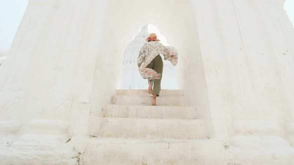 Female Traveler With Straw Hat Visiting Famous Burmese Hsinbyume Pagoda. Mandalay, Myanmar