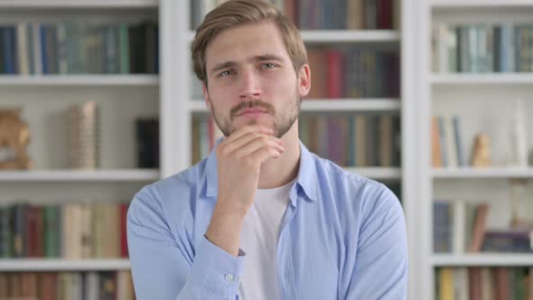 Portrait of Pensive Man Thinking