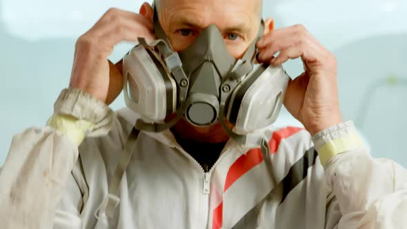 Mechanic wearing gas mask 4k