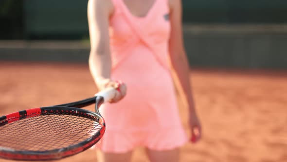 Female Sportsman on Tennis Court