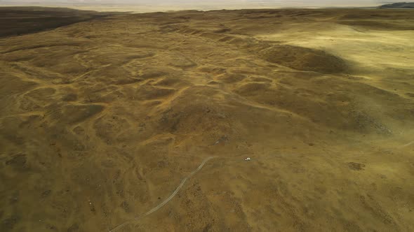 Crossing a Complex Landscape By Car