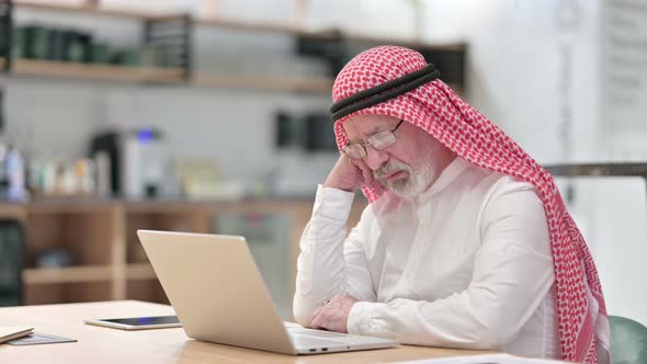 Sleepy Senior Old Arab Businessman with Laptop Having Nap