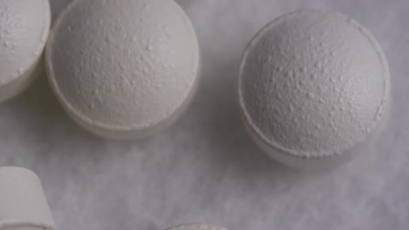 Rotating stock footage shot of vitamins and pills