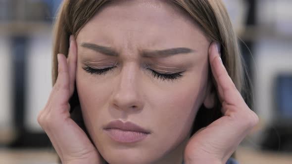 Close Up of Young Girl with Headache