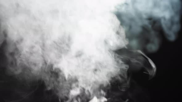 Abstract Smoke on Black Chroma Key Background