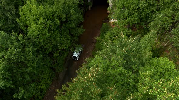 Aerial View of the Car Entering the Tunnel