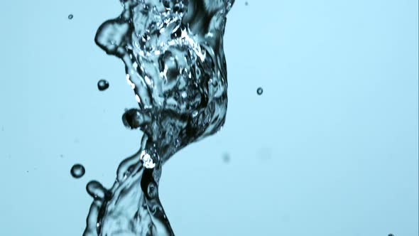 Water pouring and splashing in ultra slow motion 1500fps on a reflective surface - WATER POURS