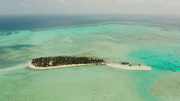 Tropical Island with Beach and Atoll with Coral. Onok Island Balabac, Philippines