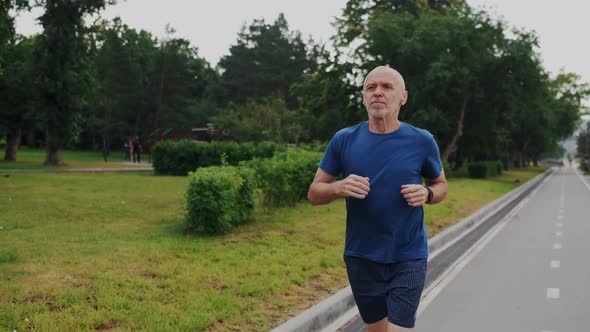 Running or Jogging in Park in Old Age