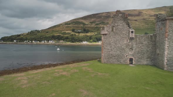 Closeup Castle Walls Ruins at Seascape Aerial