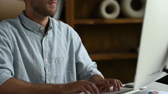 Friendly Young Adult Caucasian Businessman Freelancer or Support Center Consultant with Headphones