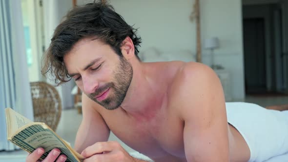 Man reading on patio