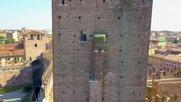 Verona, Italy: Aerial view of Castelvecchio Castle, Drone flies near the wall and tower