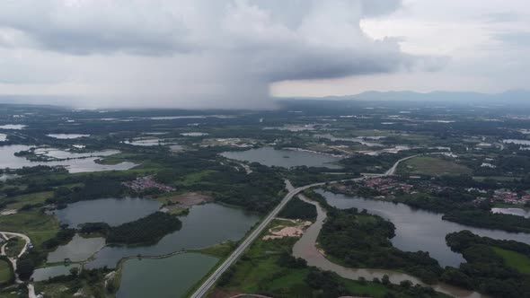 Aerial view raining day at abandoned tin mining lake