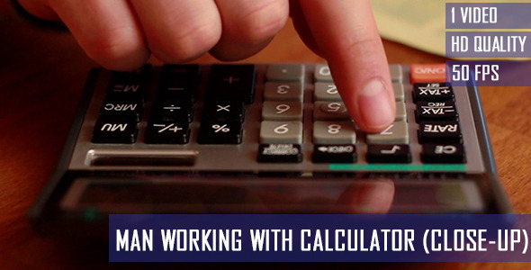 Man Working With Calculator 