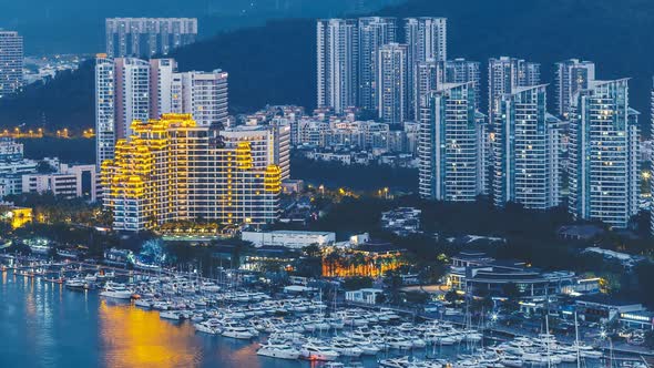 Haikou City with High Modern Buildings on Nandu River Bank