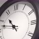 Latin Clock Face in Time Lapse on White Wall - VideoHive Item for Sale