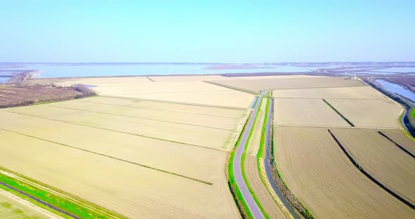 Rural Terrain Area with Boundless Fields and Narrow Bays