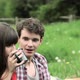 Young couple talking in field - VideoHive Item for Sale
