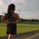 Asian Young Beautiful Woman Running for Health in the Evening Sunset on Street in Public Park - VideoHive Item for Sale