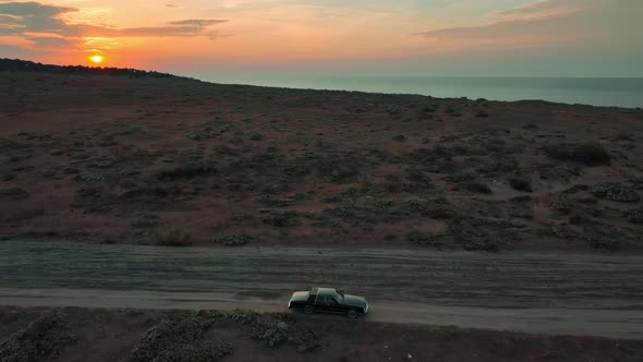 sunset and classic american car and sea