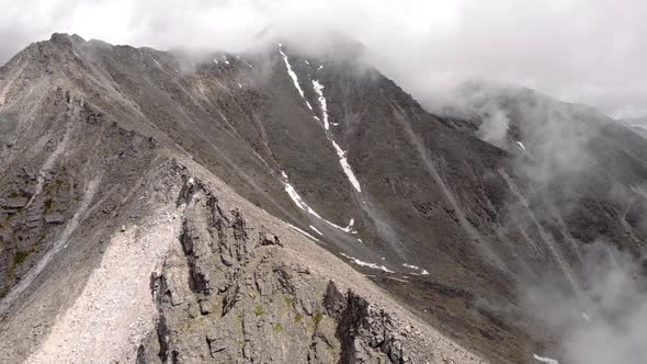 Incredible Aerial Flight Through Clouds Fog to Majestic Epic Dark Mountains