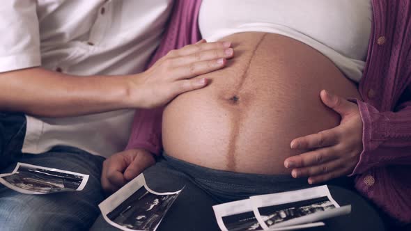 Pregnant Couple Feels Love and Relax at Home