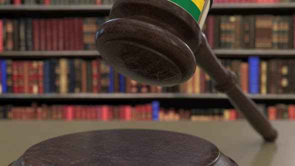 Flag of Ghana on Falling Judges Gavel in Court