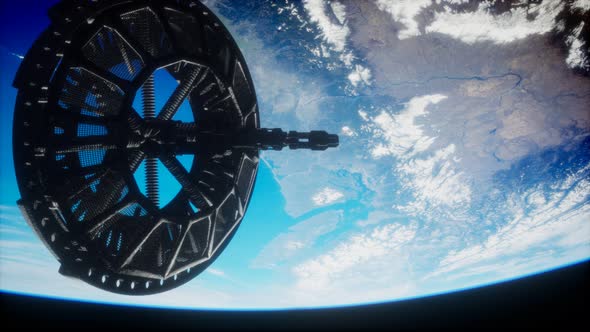 Futuristic Space Satellite Orbiting the Earth alt