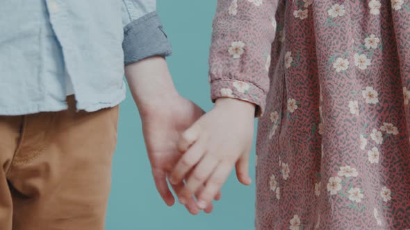 Boy and Girl Holding Hands