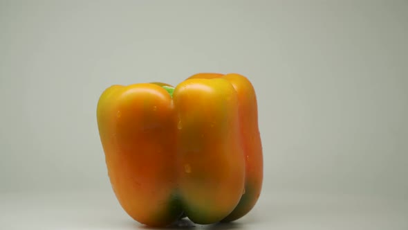 Yellow Bell Pepper Rotating and Spinning in The Turntable - Close Up Shot